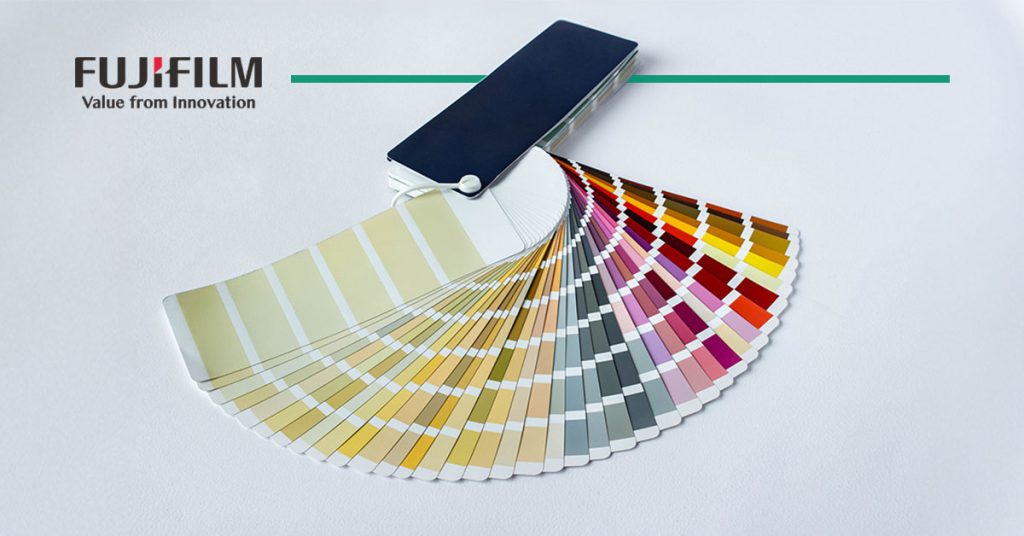 A color fan lays spread out on a white background with the Fujifilm logo in the corner